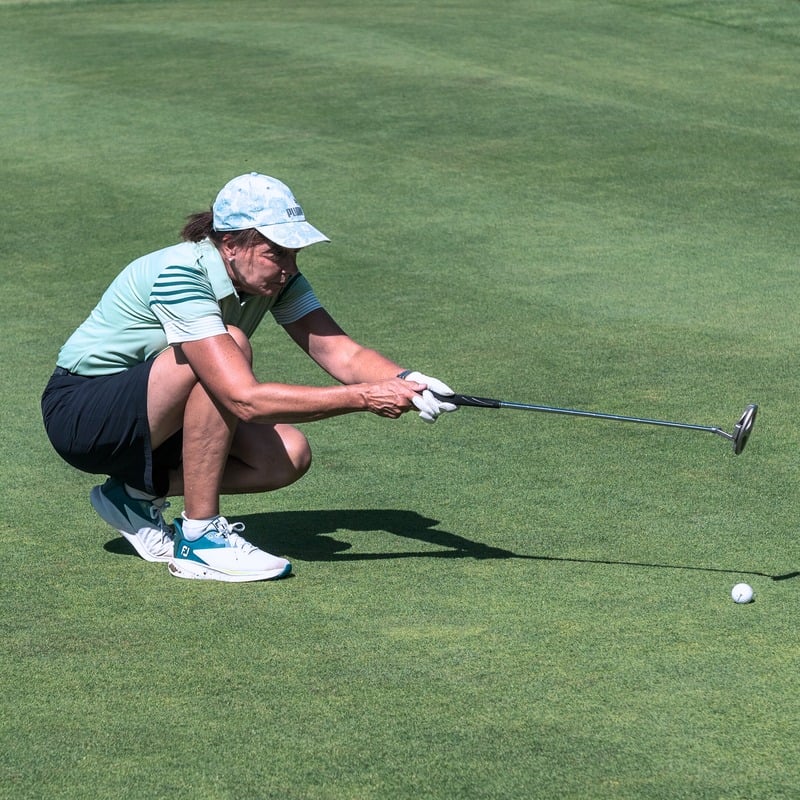 Golfspieler auf dem Grün